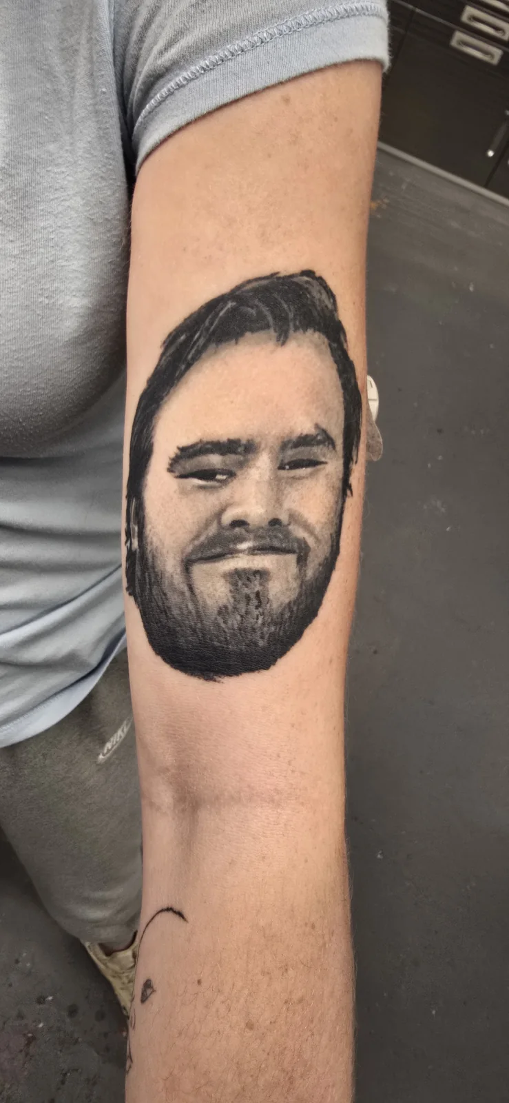 Realistic portrait tattoo by Branded Key Tattoo